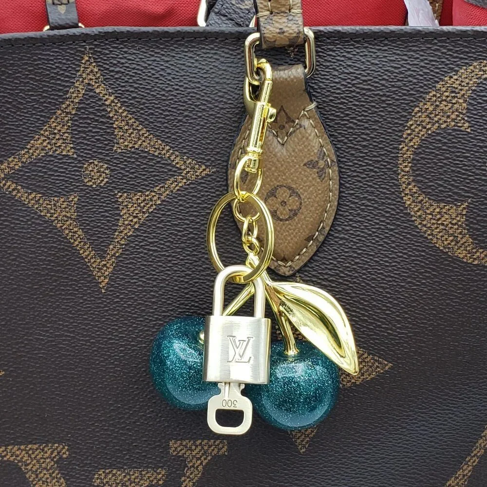 Authentic Louis Vuitton Lock & Key with Unbranded Apple Charm, Keychain